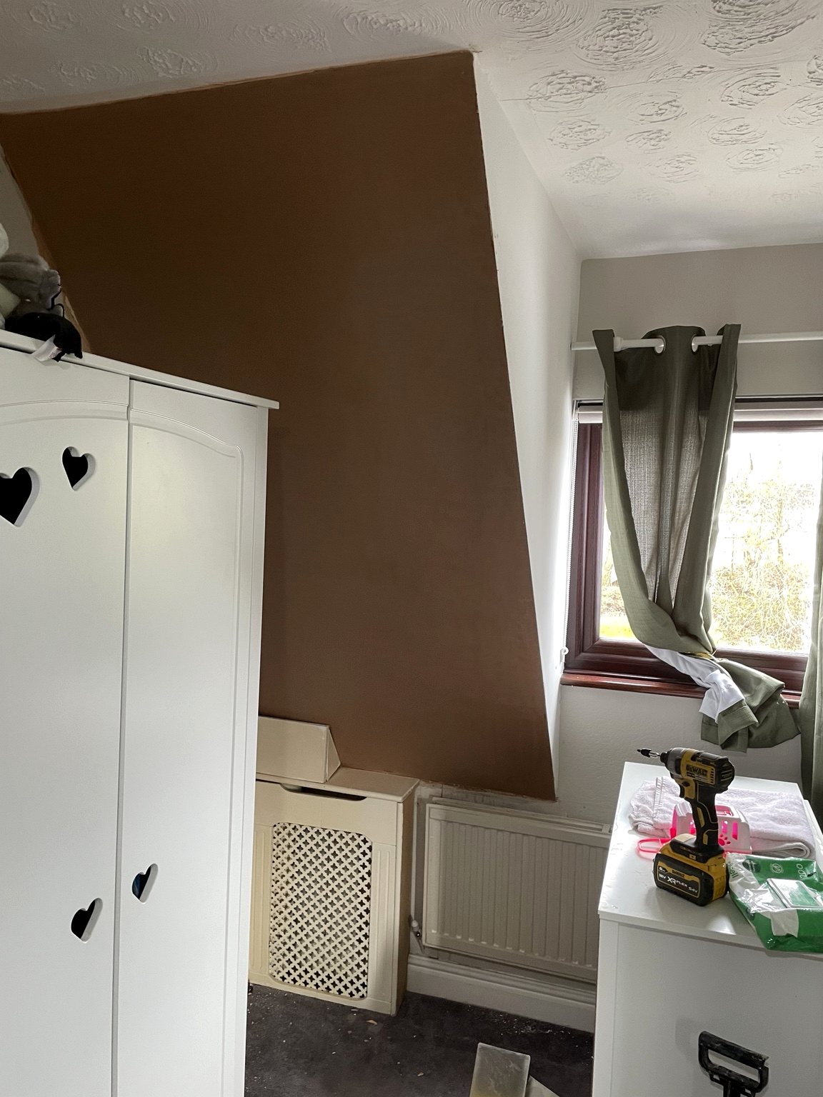 Sloped skim wall